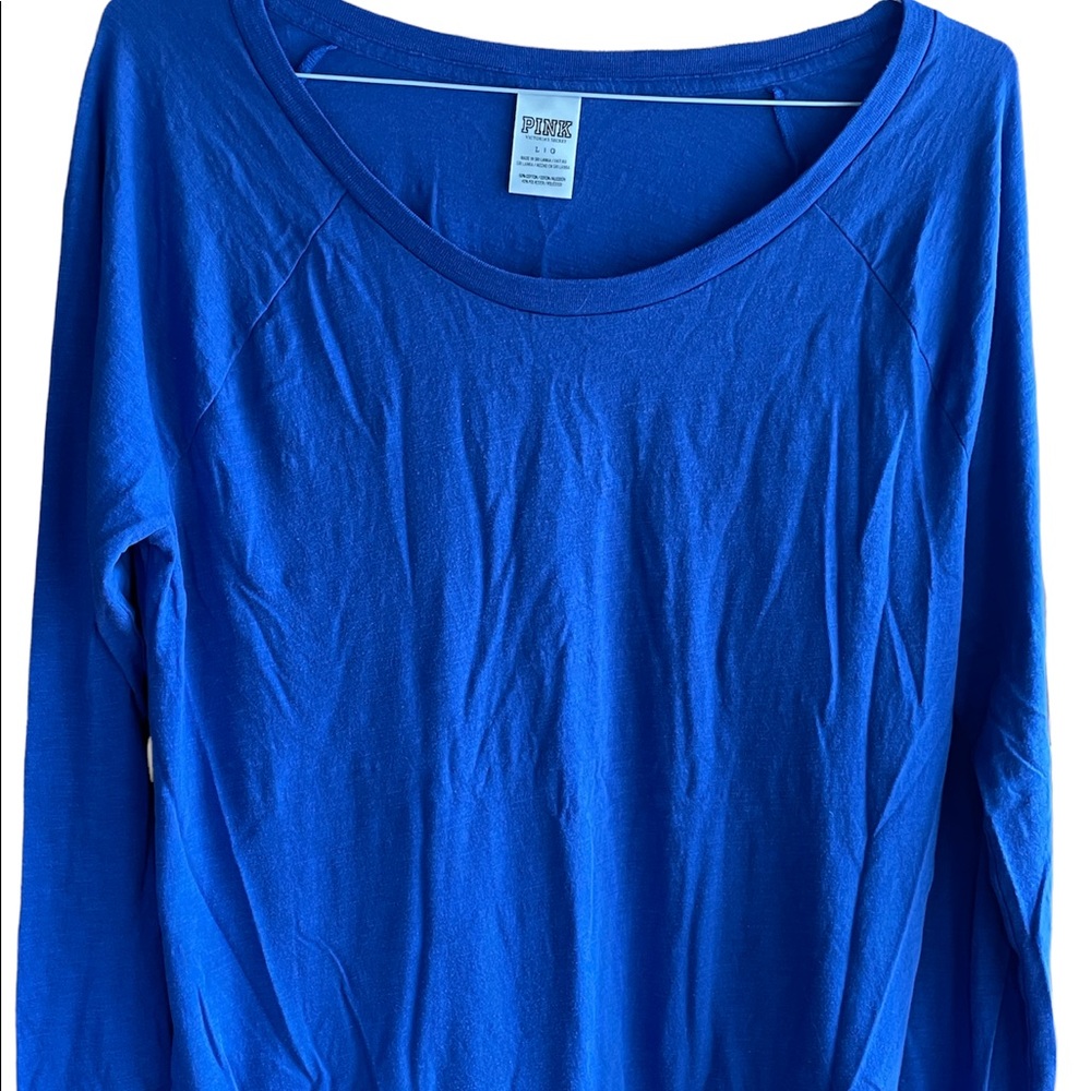 PINK Long sleeve tee.  60%Cotton/40% Polyester.